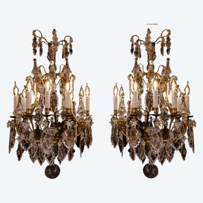 Signed by Cristalleries de Baccarat pair of Louis XV style gilt bronze and cut crystal chandeliers c