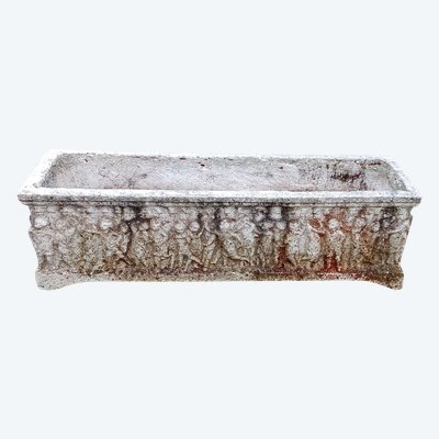 Old planter with character decoration