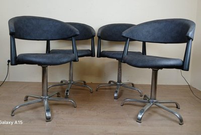 Set di quattro poltrone d'epoca circa 1980