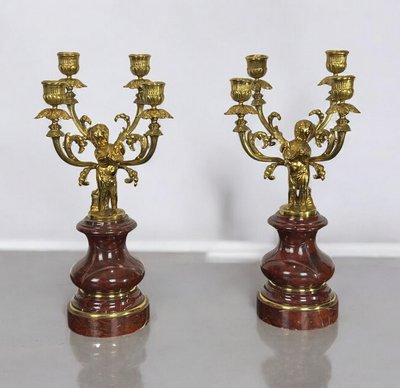 PAIR OF 4-LIGHT GILT BRONZE CANDELABRA ON A GRIOTTE MARBLE BASE