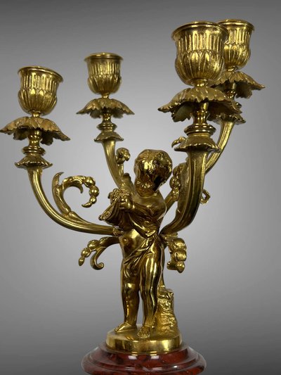 PAIR OF 4-LIGHT GILT BRONZE CANDELABRA ON A GRIOTTE MARBLE BASE