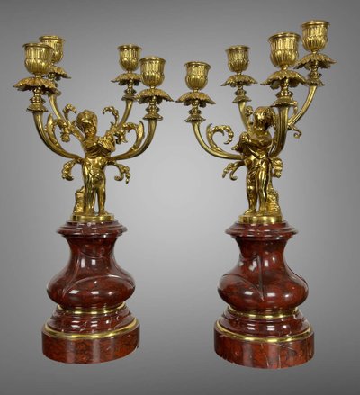 PAIR OF 4-LIGHT GILT BRONZE CANDELABRA ON A GRIOTTE MARBLE BASE