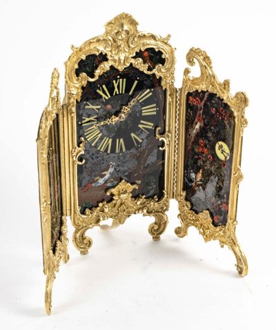 An Art Nouveau Gilt Bronze and Painted Glass Screen Clock
