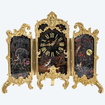 An Art Nouveau Gilt Bronze and Painted Glass Screen Clock