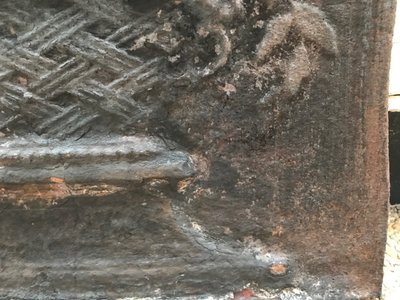 Antique cast iron fireback from the 19th century