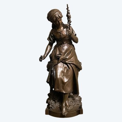 Scultura in bronzo "La filatrice" di Mathurin Moreau