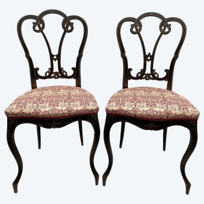 Pair of Napoleon III chairs, blackened wood and gold decor