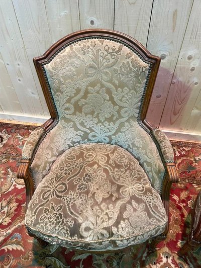 Paire de fauteuils bergères de style Louis XVI