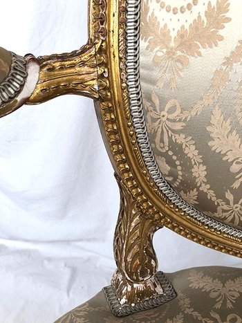 Armchair in carved and gilded wood, Louis XVI style, circa 1900