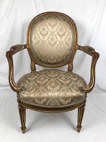 Armchair in carved and gilded wood, Louis XVI style, circa 1900