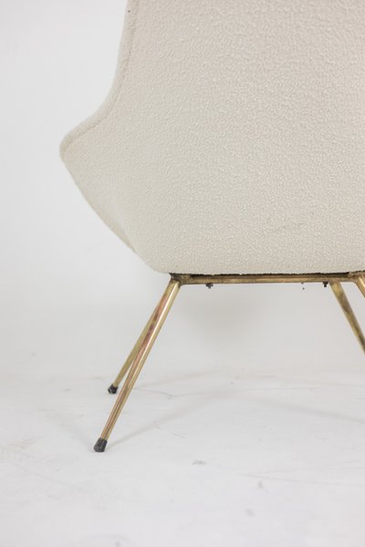 Paire de fauteuils cocktail en laiton doré. Années 1960. LS42411551