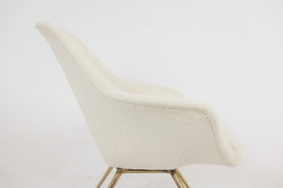 Paire de fauteuils cocktail en laiton doré. Années 1960. LS42411551