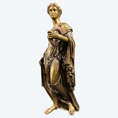 Scultura in bronzo del XIX secolo raffigurante una donna in stile antico con corona di foglie