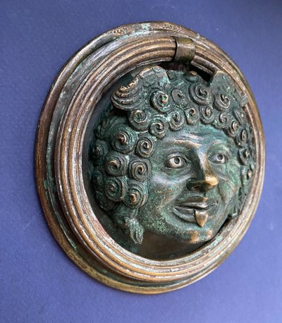 Door knocker in 19th century patinated bronze. Medusa/Gorgon head after the antique.