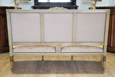 A large Aubusson sofa in carved, lacquered and gilded wood, late 19th century