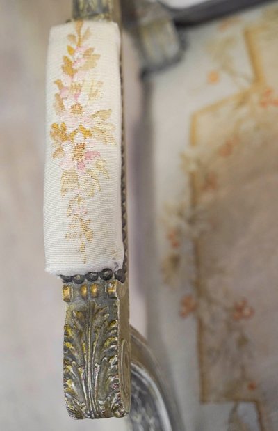 A large Aubusson sofa in carved, lacquered and gilded wood, late 19th century