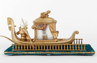 A Romantic Biscuit and Art Nouveau Gilt Metal Lamp