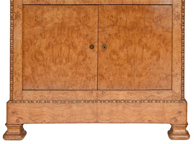 Secrétaire en placage de bois de loupe d'époque Restauration