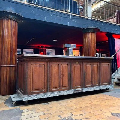 Bancone bar in rovere con piano in acciaio inox