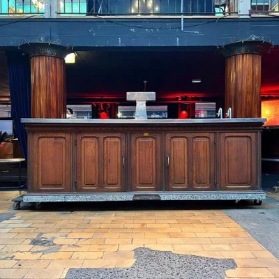 Bancone bar in rovere con piano in acciaio inox