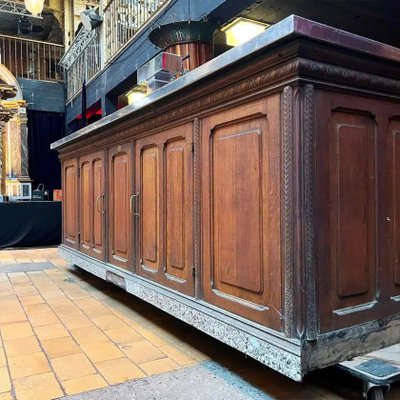 Bancone bar in rovere con piano in acciaio inox