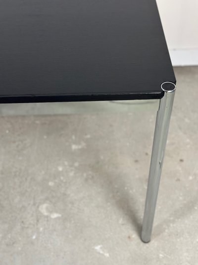 Table USM Haller T59 stratifié noir et acier chromé