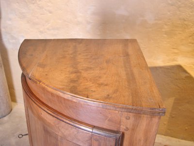 Curved walnut corner cupboard