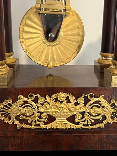 Empire mahogany portico clock