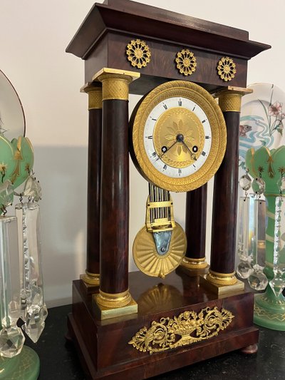 Empire mahogany portico clock