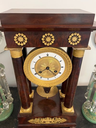 Empire mahogany portico clock