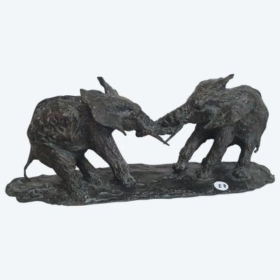 Giocatori di elefanti di bronzo
