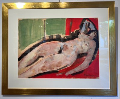 Nudo sdraiato su lenzuola rosse.