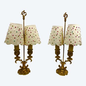 Pair of small lamps of rocaille style in gilded bronze