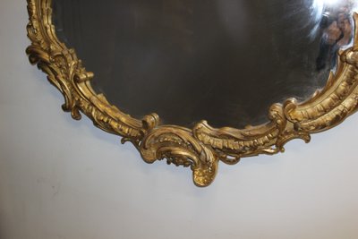 Grande specchio Luigi XV in stucco dorato XIX