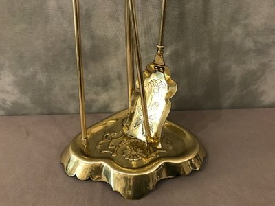 Antique fireplace set in polished and varnished brass from the 19th century