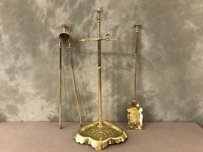 Antique fireplace set in polished and varnished brass from the 19th century
