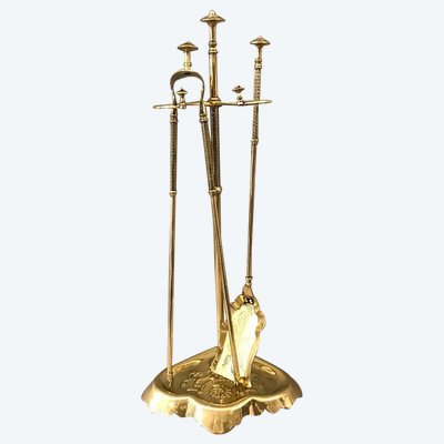 Antique fireplace set in polished and varnished brass from the 19th century