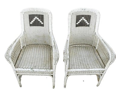 Coppia di poltrone in rattan