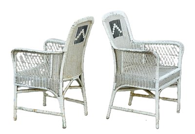 Coppia di poltrone in rattan