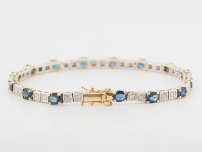 Bracciale flessibile in oro bicolore, zaffiri e diamanti