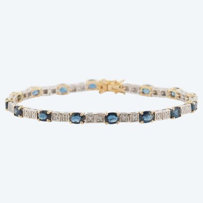 Bracciale flessibile in oro bicolore, zaffiri e diamanti