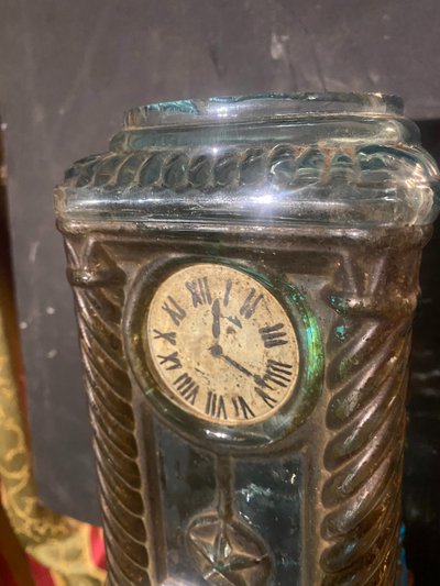 Rare molded glass bottle in imitation of a clock enhanced with painting, Napoleon III period