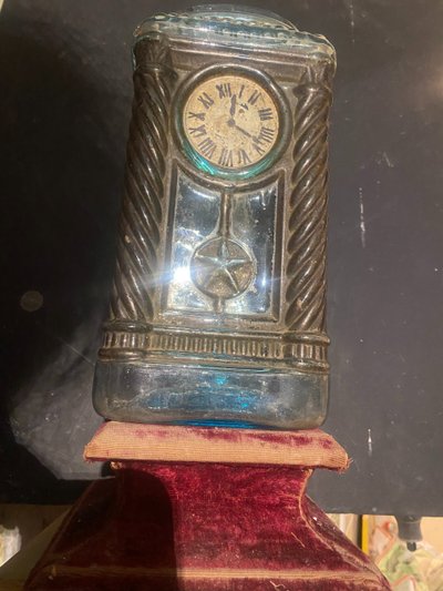 Rare molded glass bottle in imitation of a clock enhanced with painting, Napoleon III period