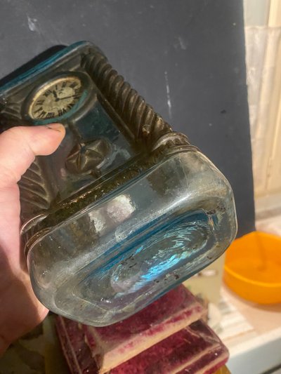 Rare molded glass bottle in imitation of a clock enhanced with painting, Napoleon III period