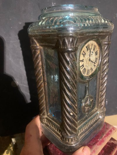 Rare molded glass bottle in imitation of a clock enhanced with painting, Napoleon III period