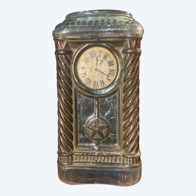 Rare molded glass bottle in imitation of a clock enhanced with painting, Napoleon III period