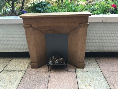 Small decorative solid wood mantel from the late 19th century