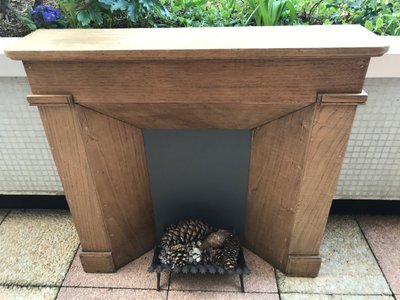 Small decorative solid wood mantel from the late 19th century