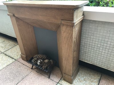 Small decorative solid wood mantel from the late 19th century