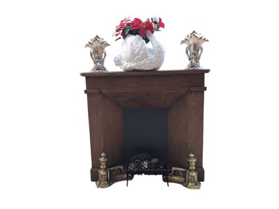 Small decorative solid wood mantel from the late 19th century
